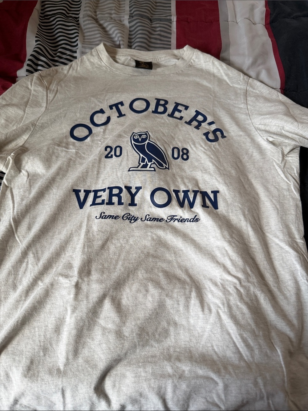OVO Cream Tee with Navy Print and Black Owl Tag